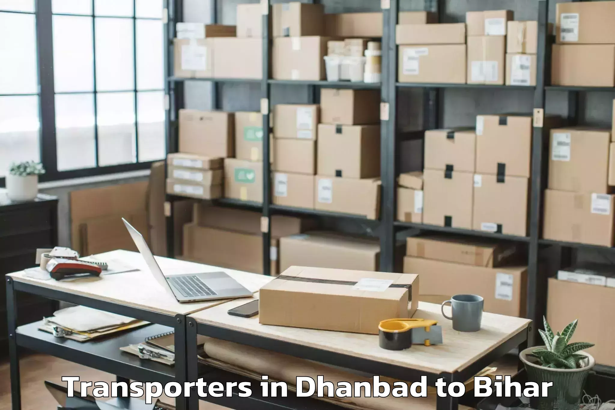 Get Dhanbad to Kusheshwar Asthan Purbi Transporters